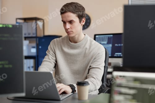 Preview: Man Programmer Using Laptop