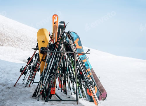 Preview: Erciyes, Kayseri, Turkey - 02.21.2022: Alpine skis temporarily left by skiers on special stands