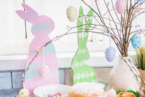 Preview: Table decoration for Easter celebration in kitchen.Tablescape for Easter holiday at home.Family reli