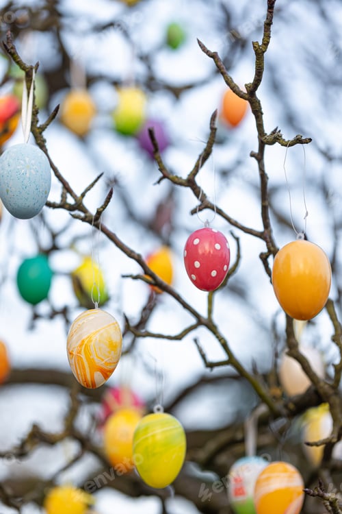 Preview: Tree decorated with colorful Easter eggs, street Easter decor.