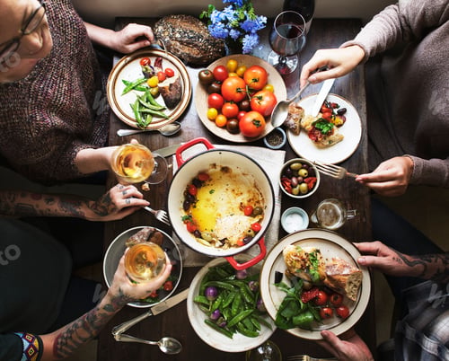 Preview: Group of adults at a dinner party
