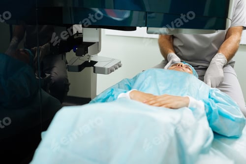 Preview: Nice adult woman waiting for her eyes to be checked