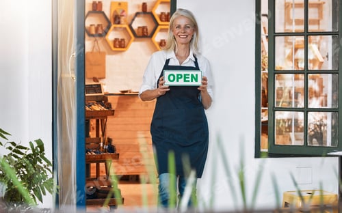 Preview: Entrepreneur, startup small business and woman with an open sign for her retail honey store. Happy,