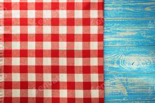 Preview: Red and White Checkered Cloth on Blue Wood