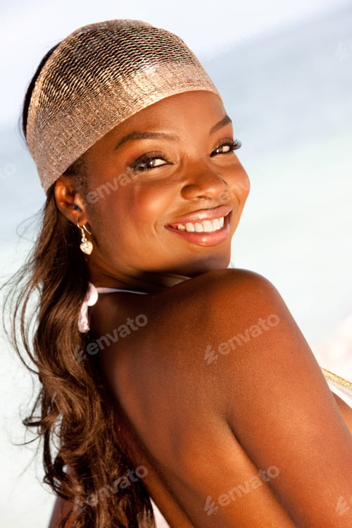 Preview: Portrait Of A Beautiful Black Woman At The Beach Smiling
