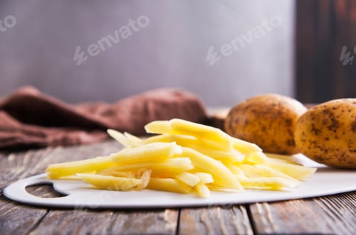 Preview: Closeup view of raw French fries.