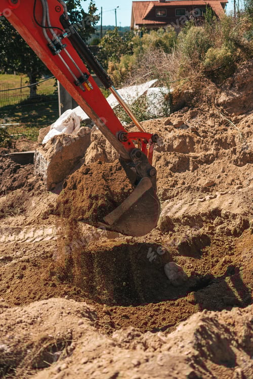 Preview: Excavator shovel digging on dirt