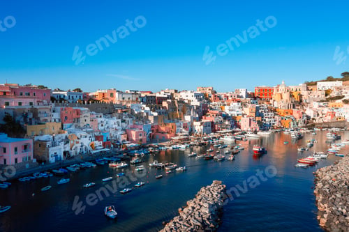 Preview: Procida colored typical houses near ocean in summer Italian vacation