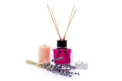 Preview: Relaxing home decor with lavender, scented candles, and oil diffuser on a white background