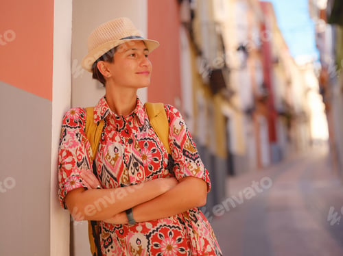 Preview: Woman strolls through colorful streets of Spanish coastal town