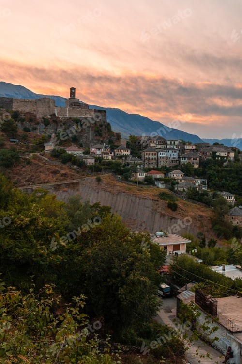 Preview: Sunset over the clock tower and fortress of Gjirokaster, Albania