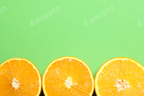 Preview: Flat lay composition with ripe oranges and space for text on color background