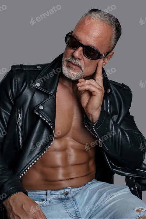 Preview: Striking portrait of a middle-aged male model with chiseled physique