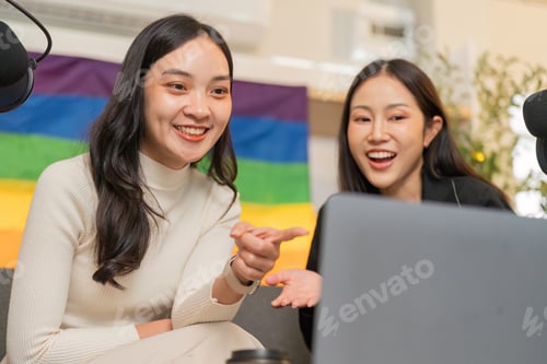 Preview: LGBTQ friends discussing digital content in a cozy studio