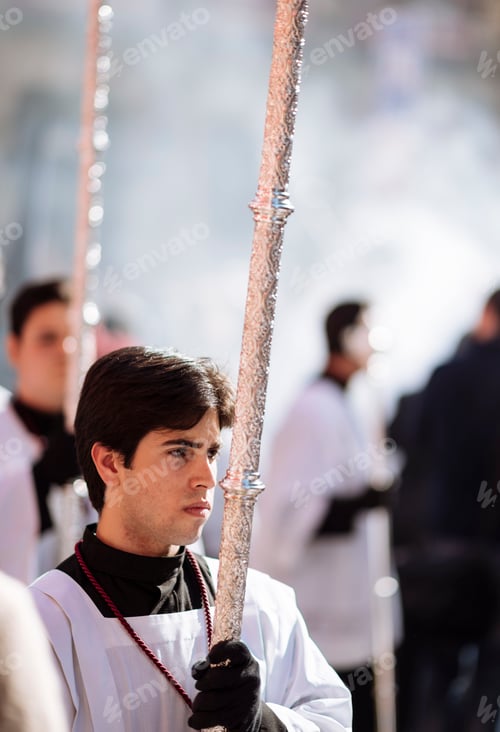 Preview: Solemn procession participant holding a staff