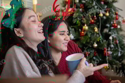 Preview: Cheerful Women Celebrating Christmas with Festive Headwear