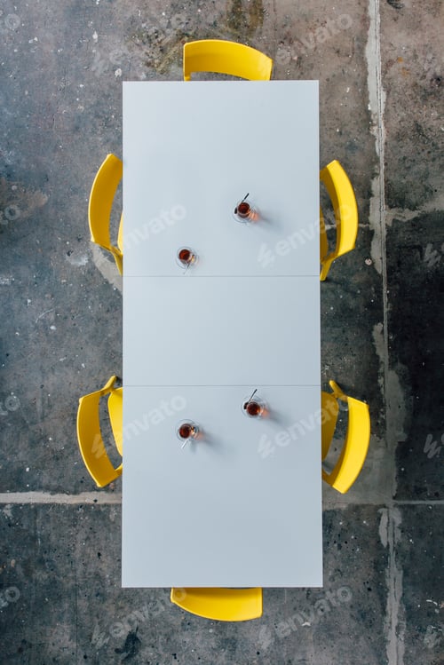 Preview: Conference table with turkish tea cups seen from above