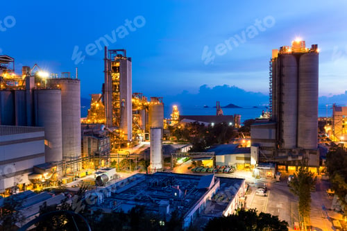 Preview: Cement industrial building at sunset