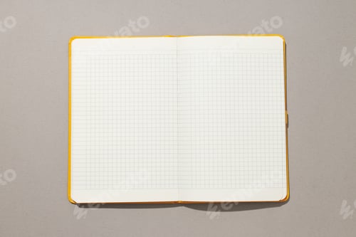Preview: An open notebook lies on a light background