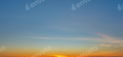 Preview: Morning sky scene with a bright golden light. Beautiful sunrise with clouds soft. Nature background