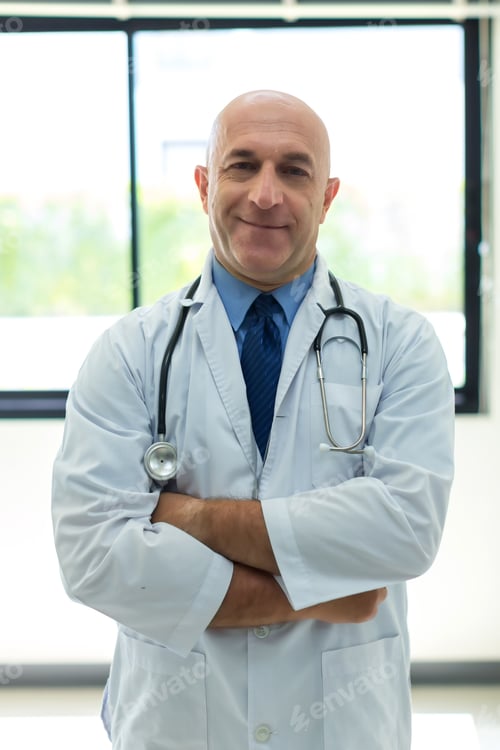 Preview: Doctor at hospital. Friendly doctor dressed in uniform with stethoscope.