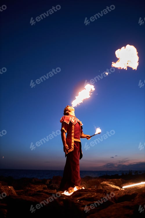 Preview: Young man breathing fire