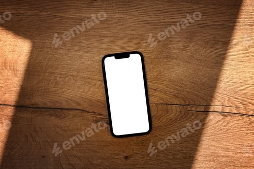 Preview: Smartphone with blank white mockup touchscreen on teak wooden table