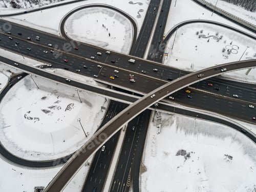 Preview: Aerial view of a freeway intersection Snow-covered in winter.