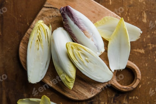 Preview: Belgian endive or chicory and red Radicchio vegetables, as witlof salade