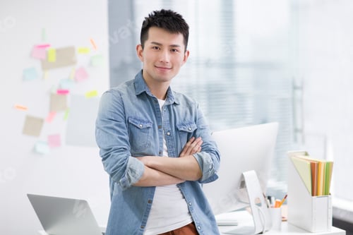 Preview: Portrait of young man in office
