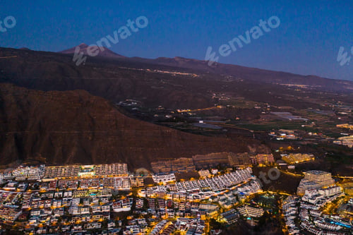 Preview: Top view of the houses located on the rock of Los Gigantes at sunset, Tenerife, Canary Islands