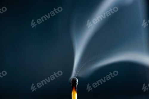 Preview: Close up view of wooden burnt one match extinct on dark background