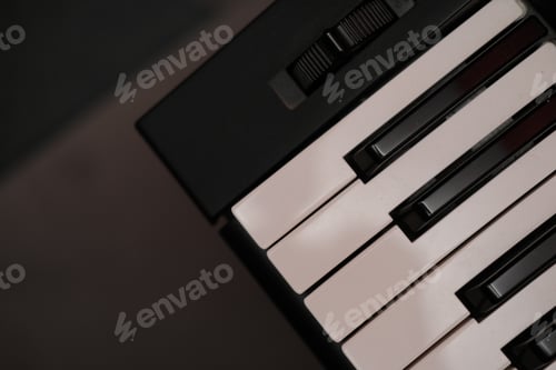 Preview: Top view closeup of the keyboards of a synthesis instrument