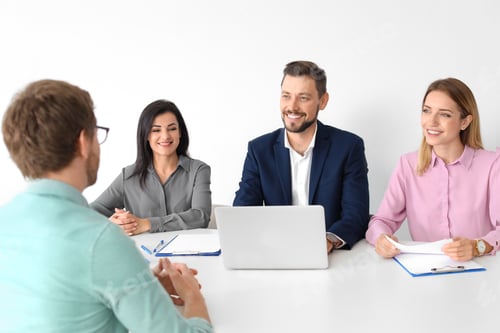 Preview: Human resources commission conducting job interview with applicant in office