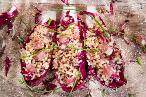 Preview: Boat of brown rice with red radicchio and speck