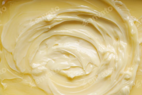Preview: detail shot of fresh butter in a container