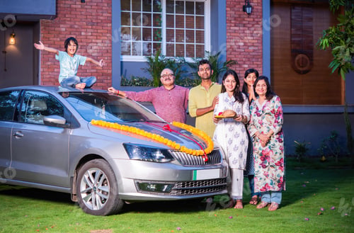 Preview: Indian asian family buys new car and standing for photograph wit
