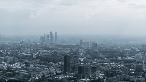 Preview: Dark megapolis cityscape on hazy day