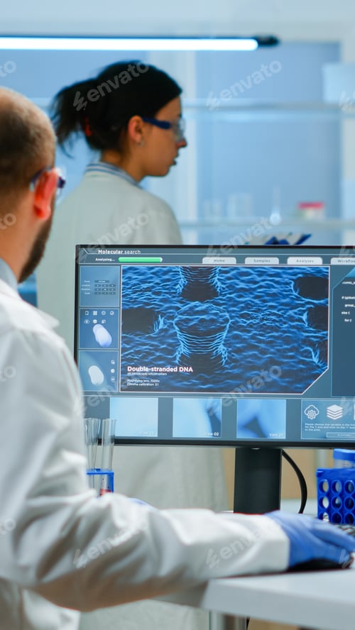 Preview: Man scientist working to develop a new vaccine in modern equipped laboratory
