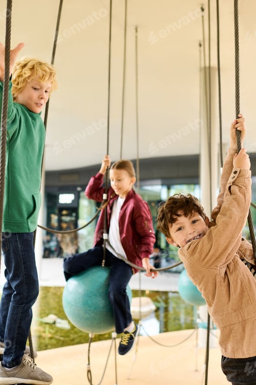 Preview: Joyful childhood moments during autumn playtime at a vibrant playground