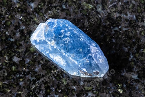 Preview: rough single blue sapphire crystal on black