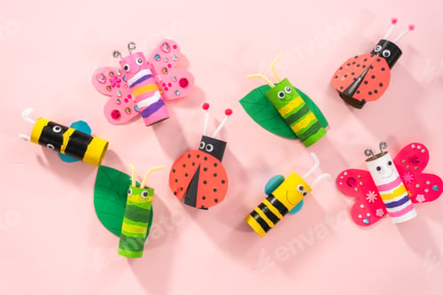 Preview: Handmade Crafty Colorful Insect Decorations on Pink Background