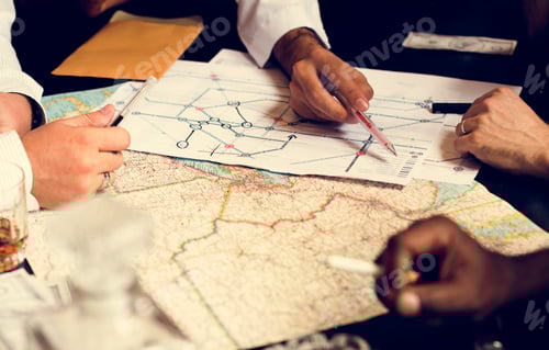 Preview: Group of people planning with the map