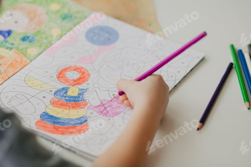Preview: 5 years old boy preschool draws with a pencil
