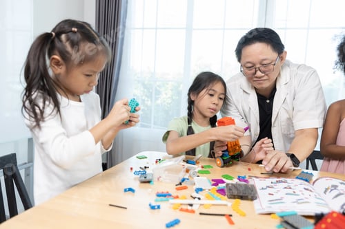 Preview: Education STEM children student girl classroom in school. Robot assembly training, brain development