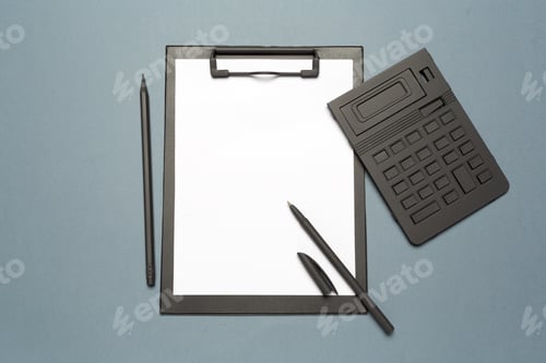 Preview: Notes clipboard with pen, calculator and blank sheets of paper as mock up copy space, top view