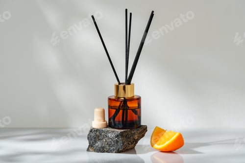 Preview: Aromatic Reed Diffuser on a Stone Base With Orange Slice Accent