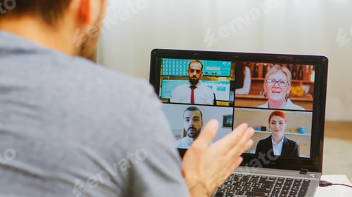 Preview: Man on a video call with work colleagues