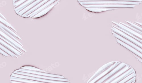 Preview: cream texture cosmetic smears on pastel pink background with space for text