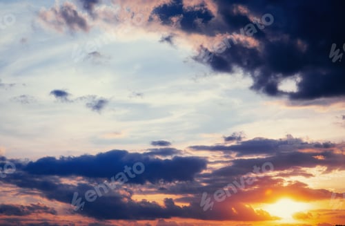 Preview: cumulus clouds at sunset.